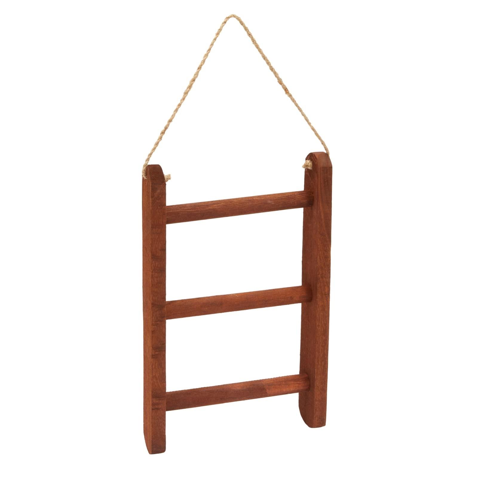 Utilize a vintage ladder for towel storage and decoration in your Farmhouse Bathroom