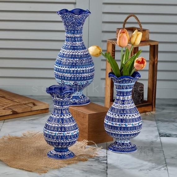 Decorate with blue ceramic vases for a stylish centerpiece