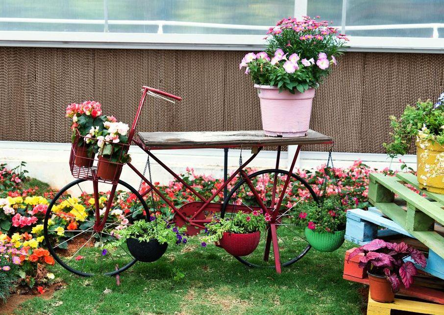 Repurpose old furniture as unique garden décor in your small backyard