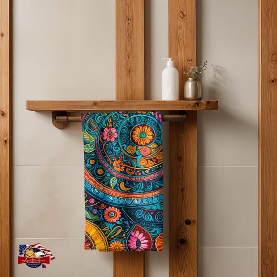 Add a pop of color with vibrant ‌towels in your boho bathroom