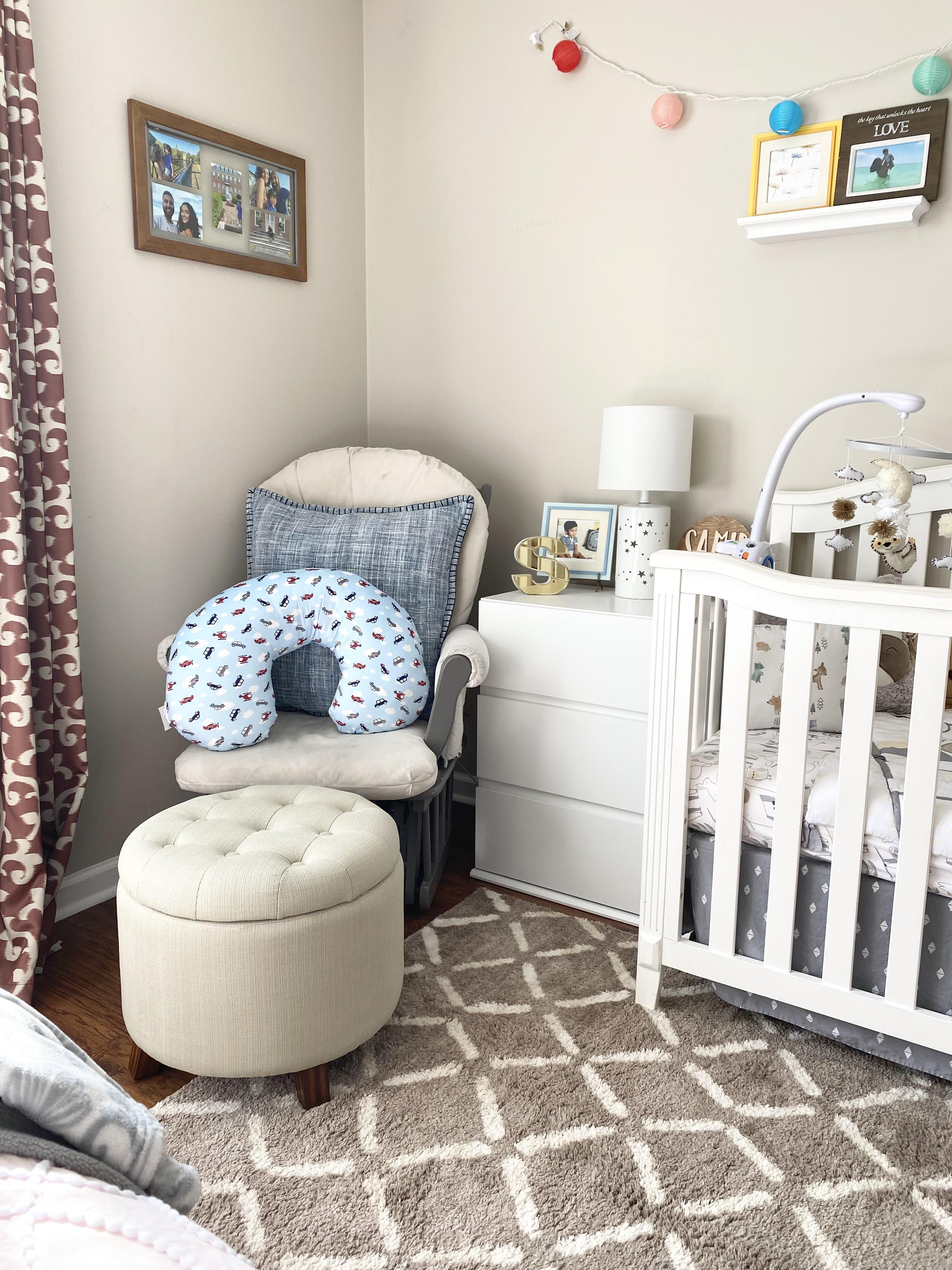 A small side table holds essentials within reach in the Nursery Nook