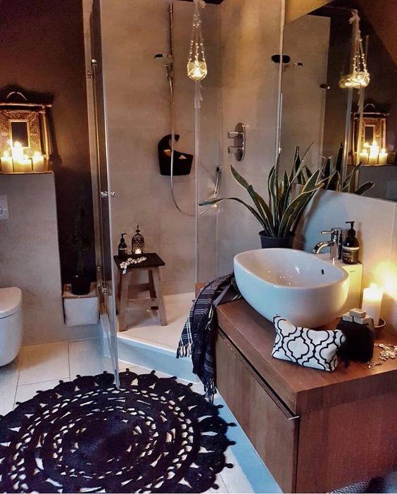 Use candles for soft lighting in your serene boho bathroom space
