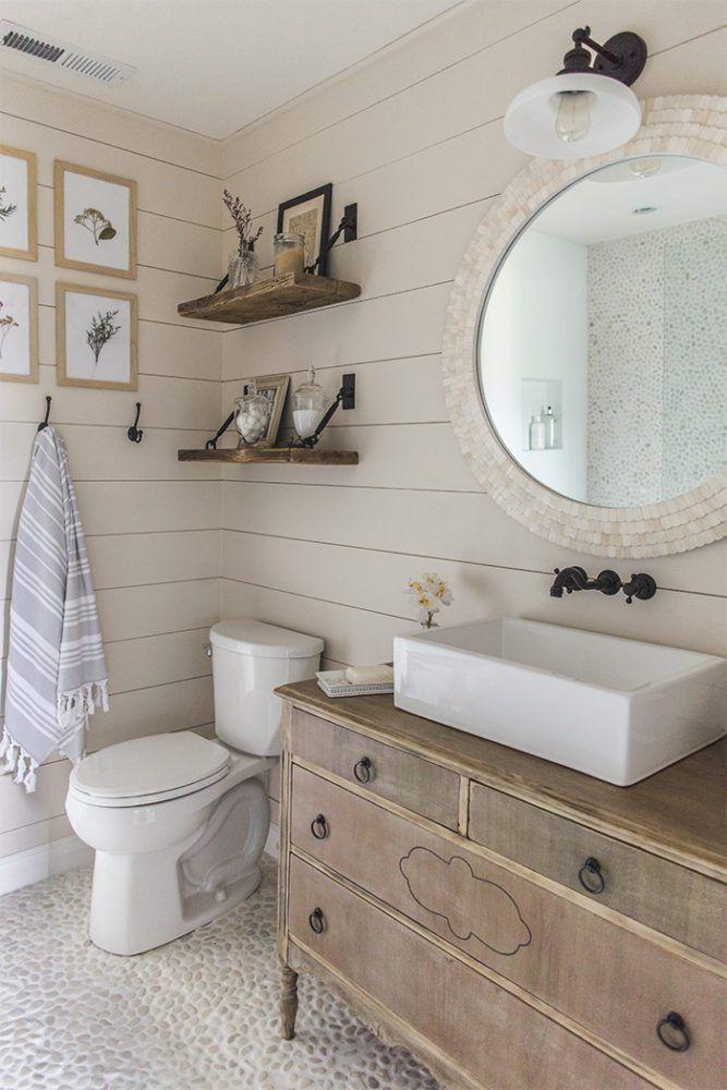 Incorporate shiplap walls for that classic farmhouse bathroom aesthetic