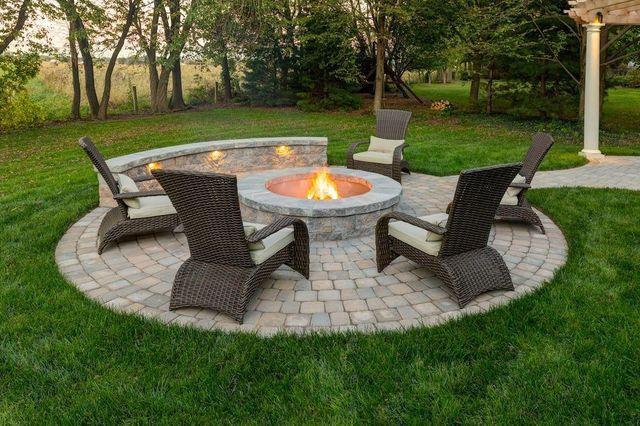 Add a fire pit for warmth in your small backyard