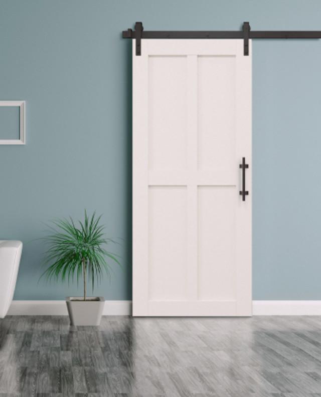 Barn doors add country charm to Chalet Bathrooms