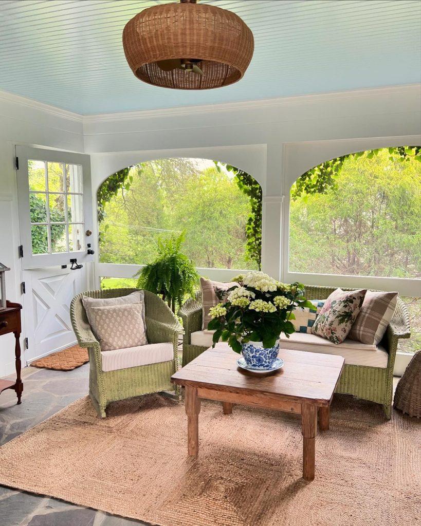 Create an invitation to nature with potted plants on your screened porch