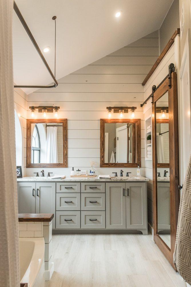 Soft, neutral colors create a serene retreat in your farmhouse bathroom oasis