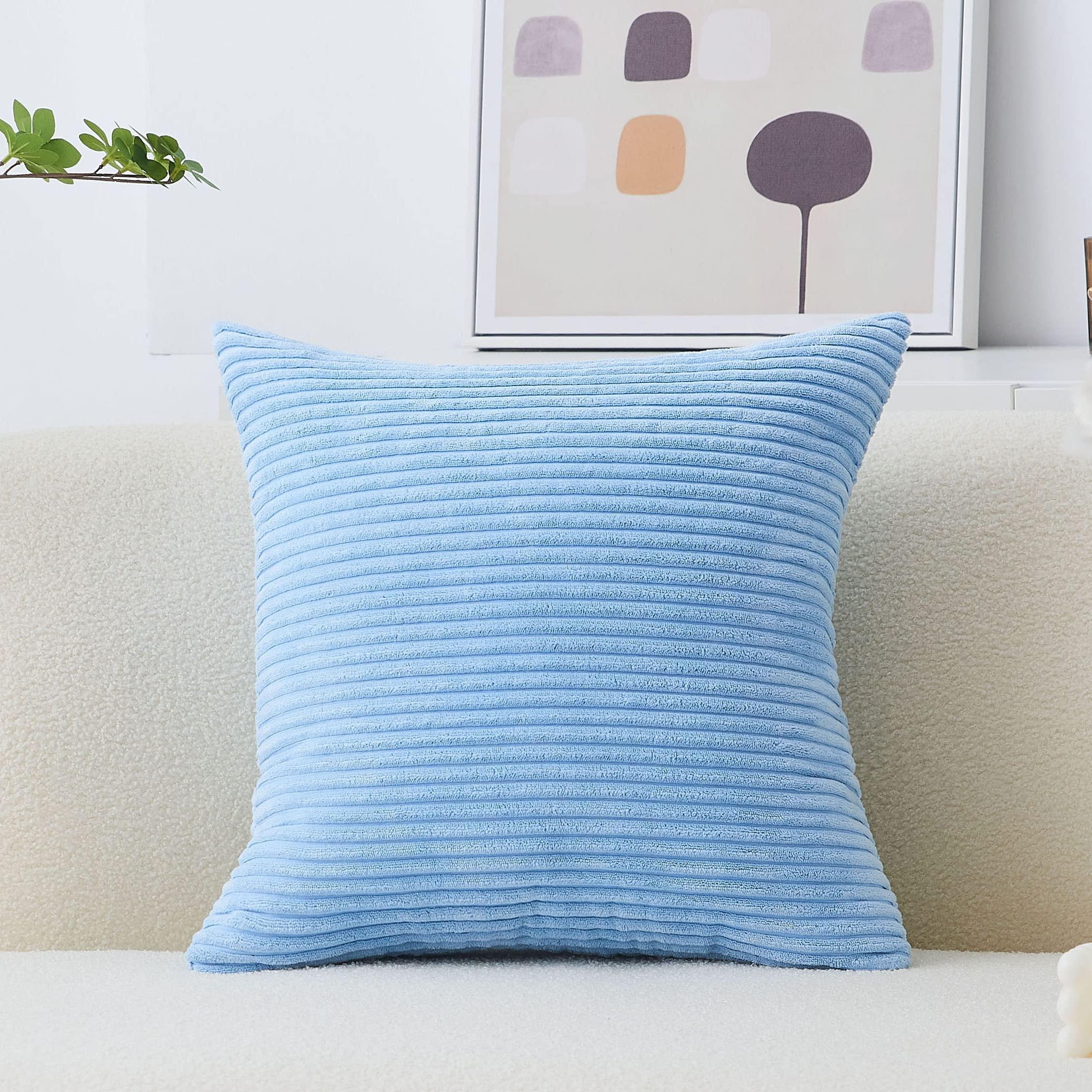Implement blue-themed throw pillows for an easy refresh