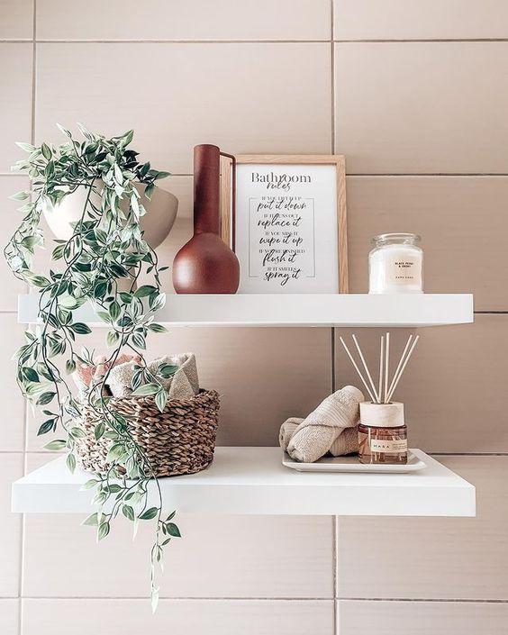 Install open shelving to display decor in your boho bathroom