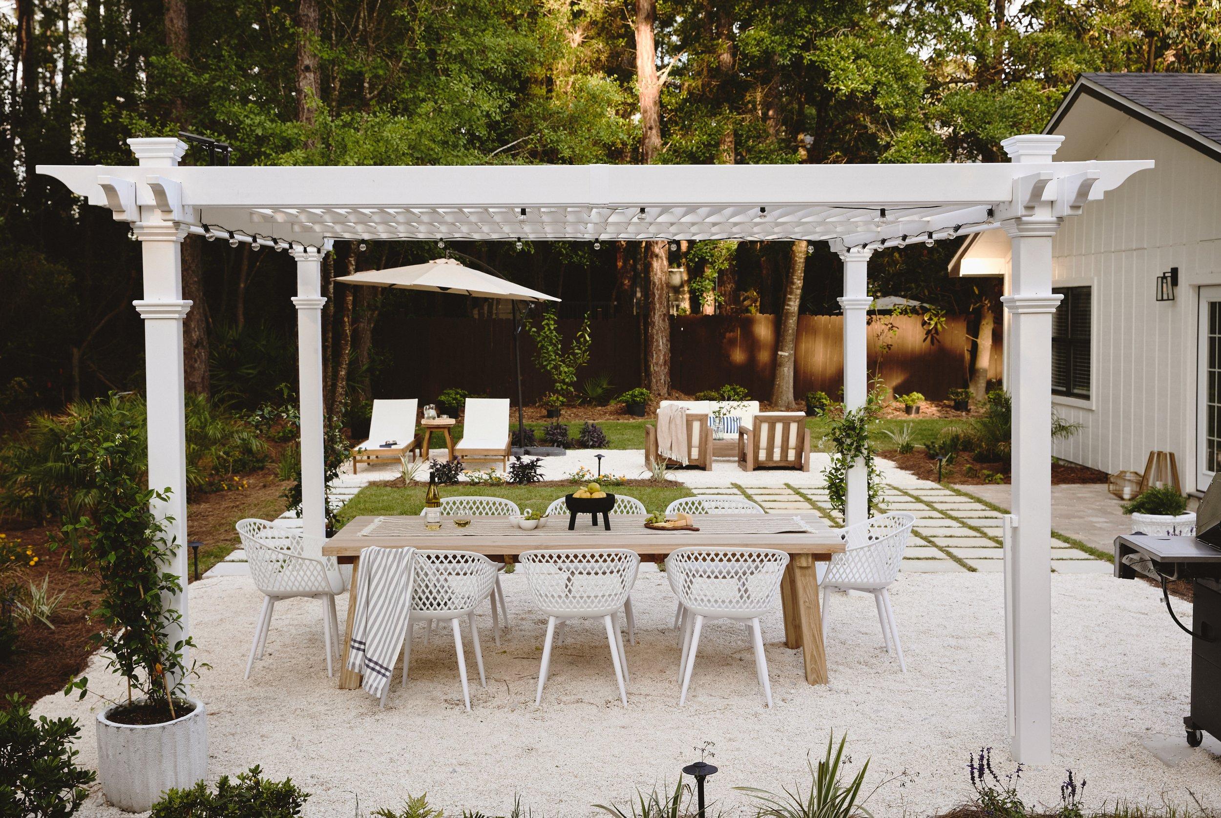 Add a rustic pergola for shade and style in your backyard