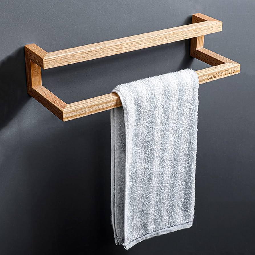 Hang a wooden wall-mounted towel rack for easy access in your wooden bathroom