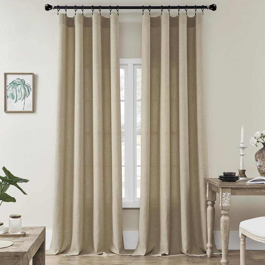 Use curtains in natural fabrics to filter light beautifully in your earthy living room