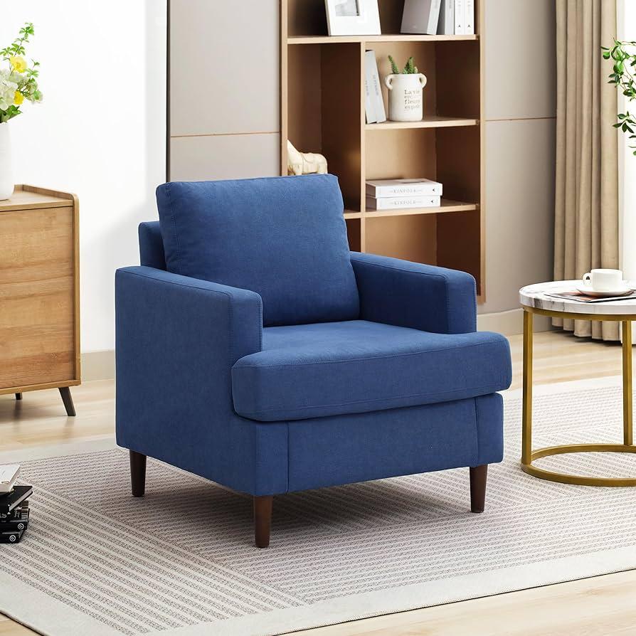 Design a cozy reading nook with blue upholstered furniture