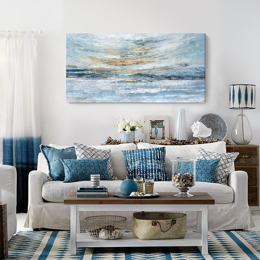 Embrace coastal vibes with soft blue living room accents