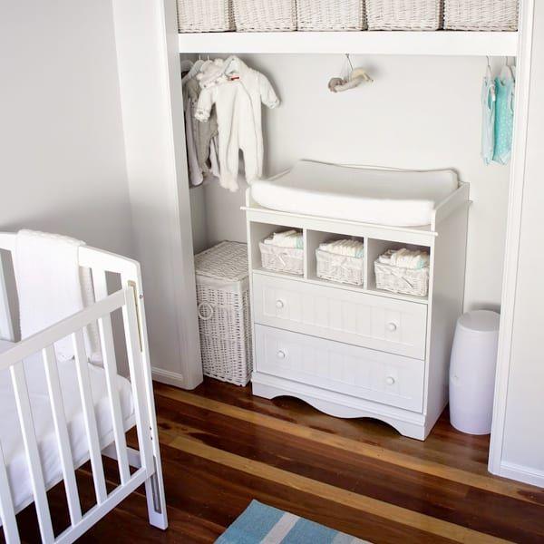 Add a changing table with ample space for easy access in your Nursery Nook