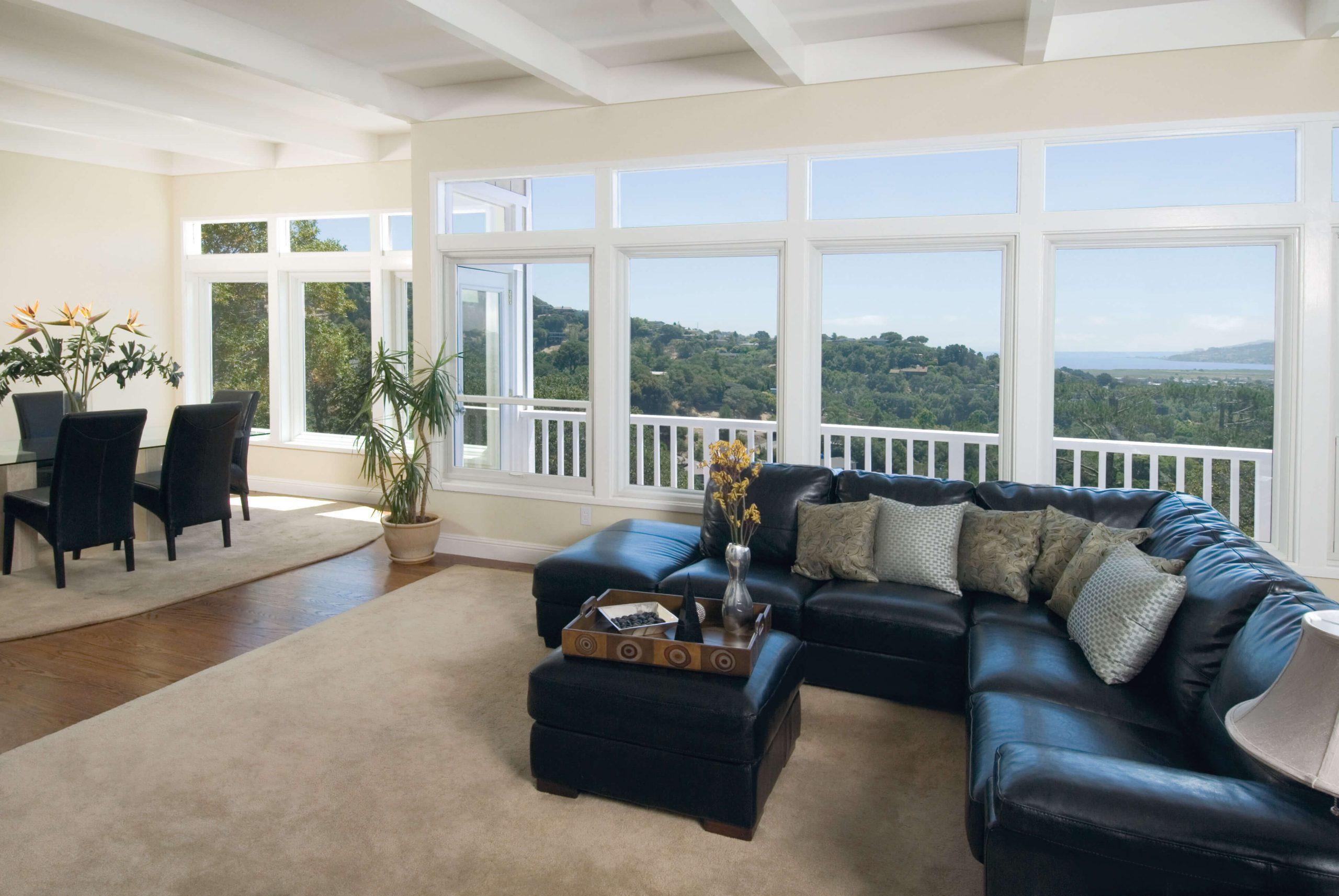 Install large windows to flood your earthy living room with natural light