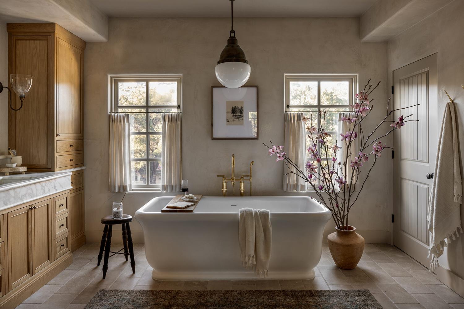 Decorate with soft, neutral colors to create a calming atmosphere in your Farmhouse Bathroom
