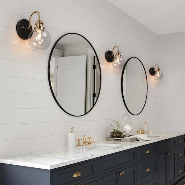 Incorporate sconces for soft, warm lighting in your farmhouse bathroom