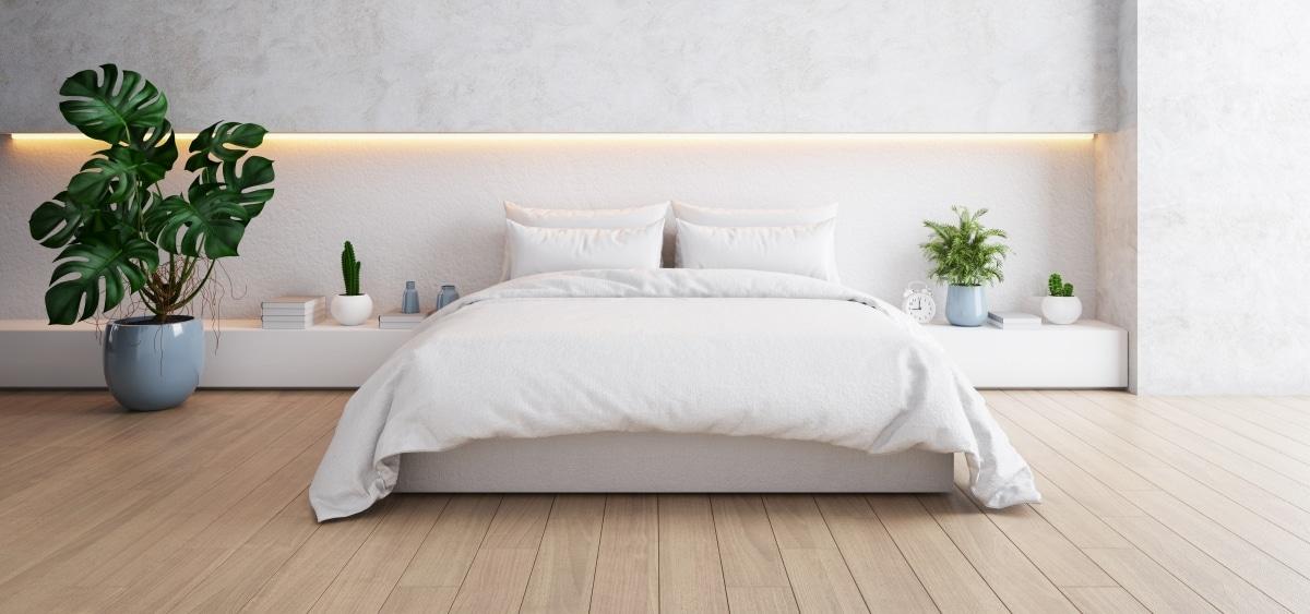 Prioritize a comfortable mattress for restful nights in your minimalist bedroom