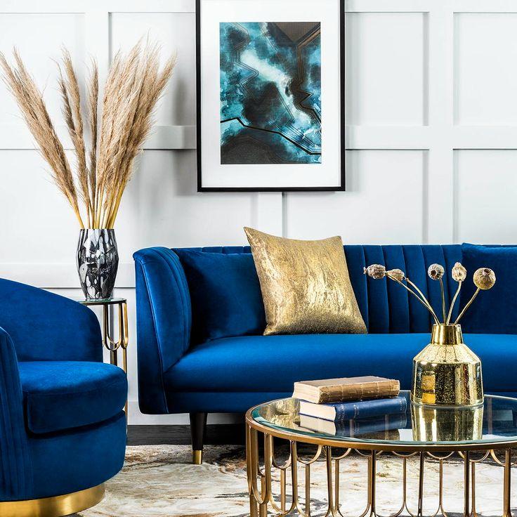 Use a statement blue sofa as a focal point in the living room