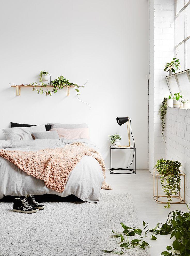 Incorporate plants for a breath of fresh air in your minimalist bedroom