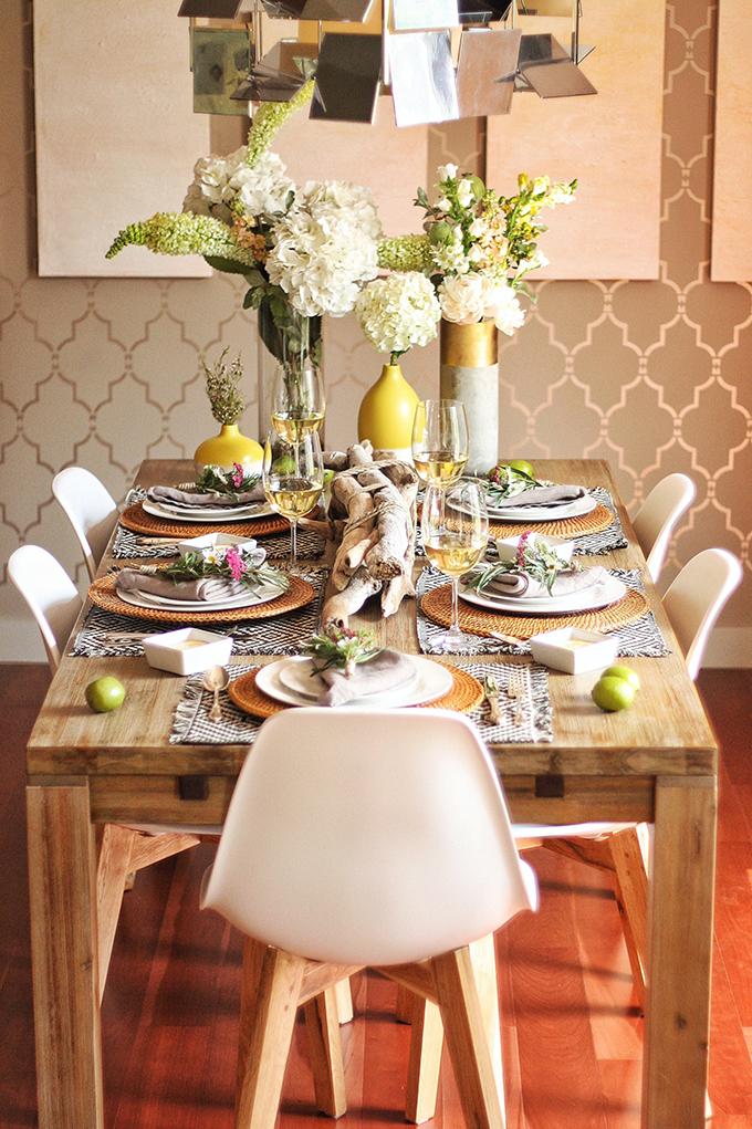 Showcase driftwood as a centerpiece for a rustic touch in your earthy living room