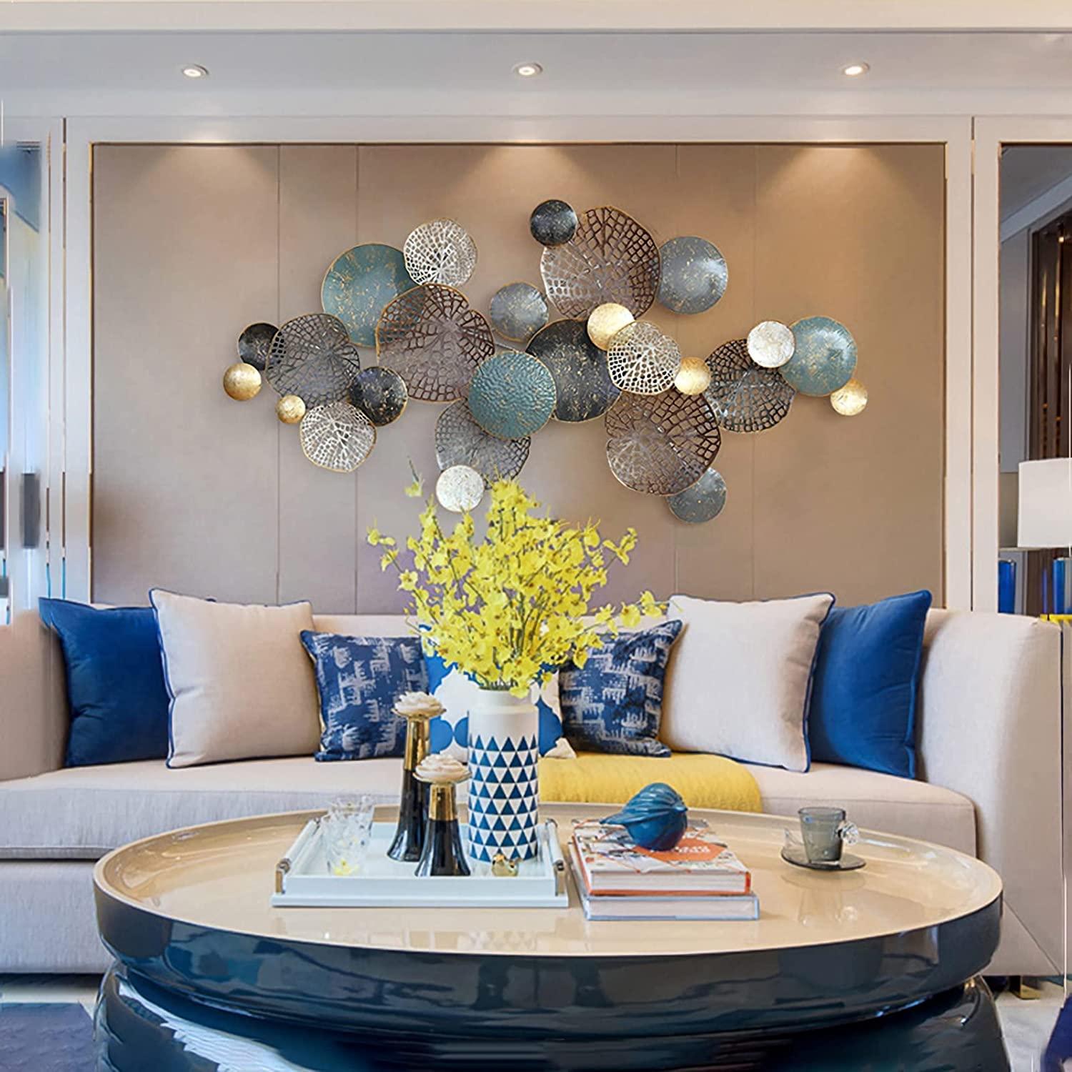 Accessorize with metallics to add glamour to your blue living room