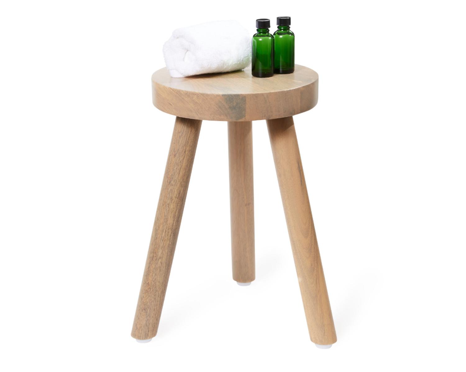 Consider a wooden bathroom stool for chic seating and easy accessibility