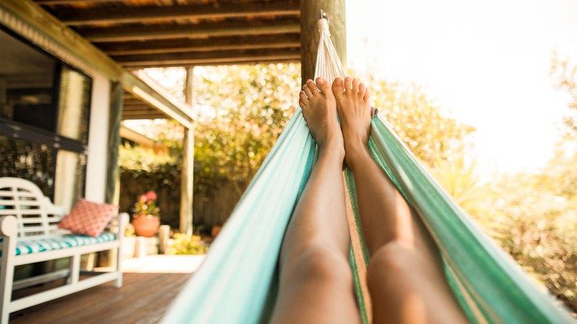 Incorporate a hammock for relaxation on your screened porch