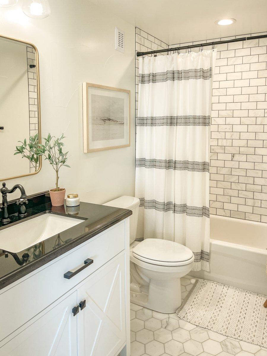 Thoughtful details make all the difference in your delightful farmhouse bathroom sanctuary