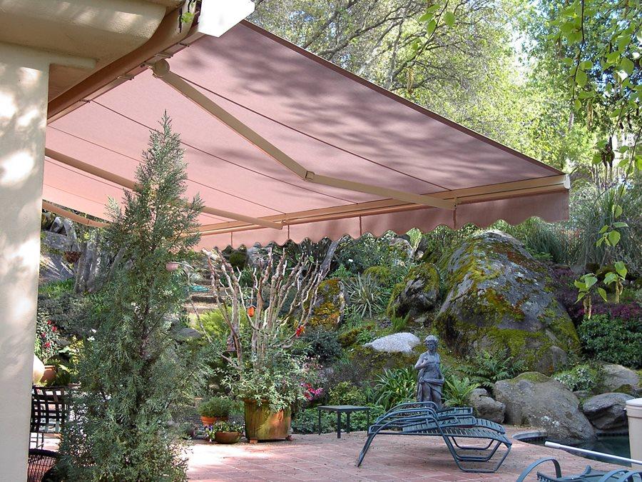 Install retractable awnings for shade in your small backyard