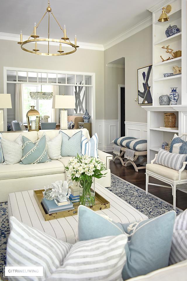 Embrace coastal vibes with soft blue living room textiles and decor