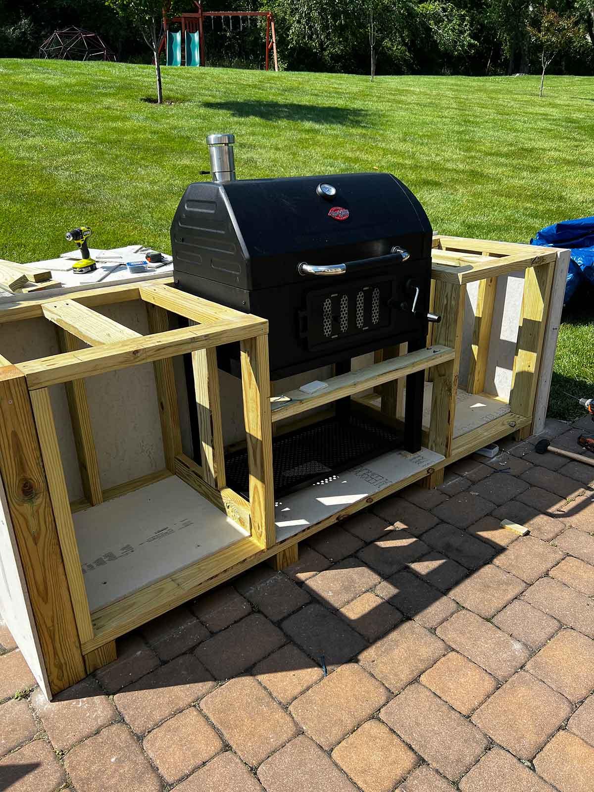 Set up a small barbecue station for entertaining in your backyard