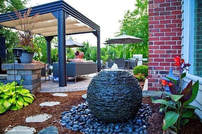 Incorporate a small water feature in your screened porch design