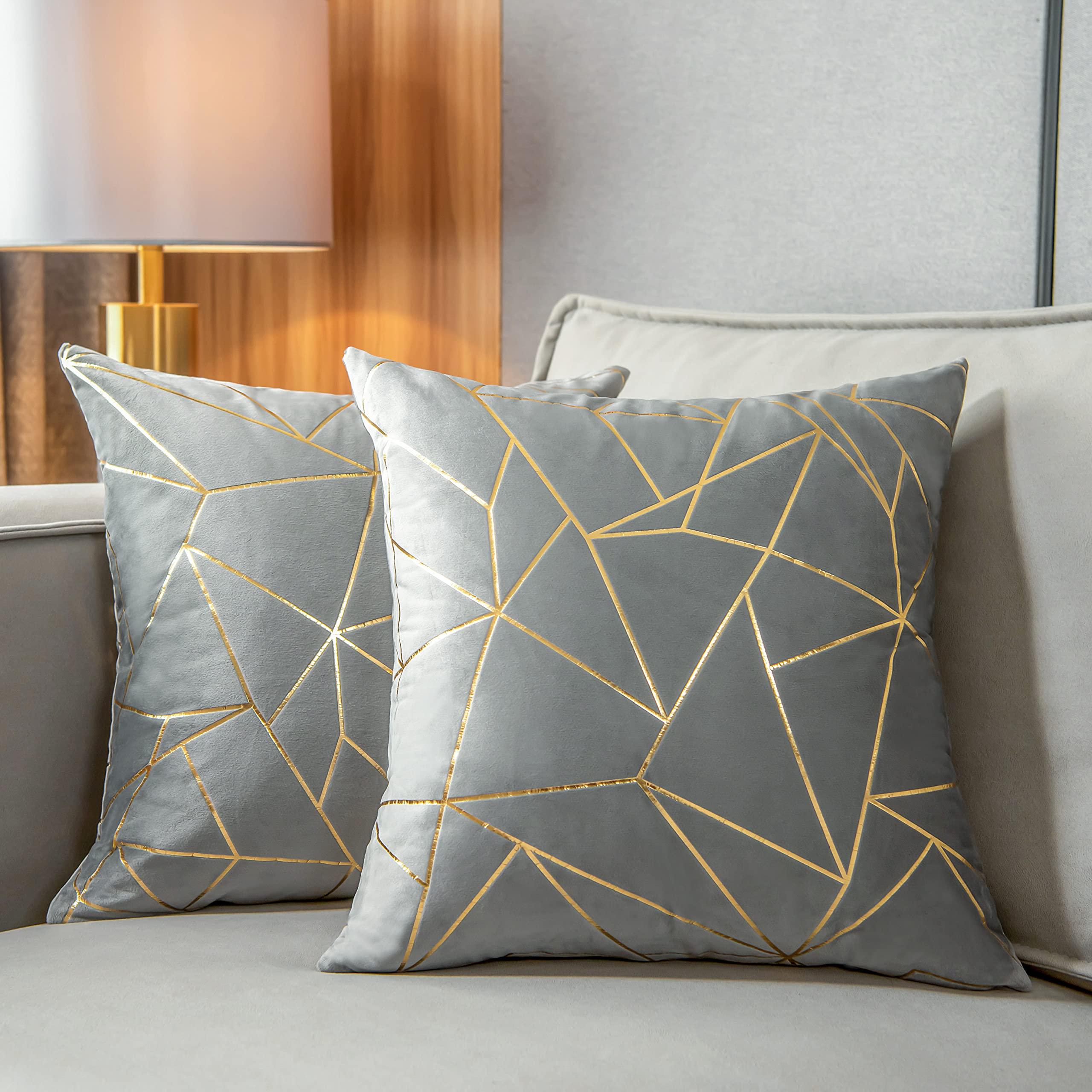 Experiment with geometric patterns for cushions in your contemporary living room