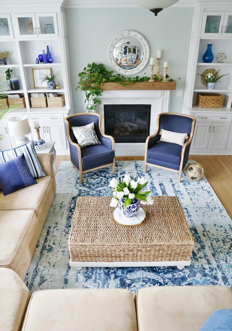 Contrast crisp white furniture with a blue living room palette