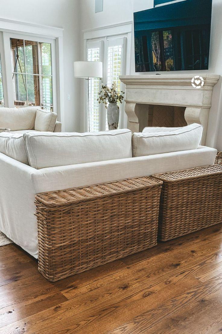 Use baskets for storage to maintain a tidy and earthy aesthetic in your Earthy Living Room