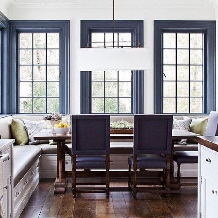 Frame windows with elegant blue trim or casings