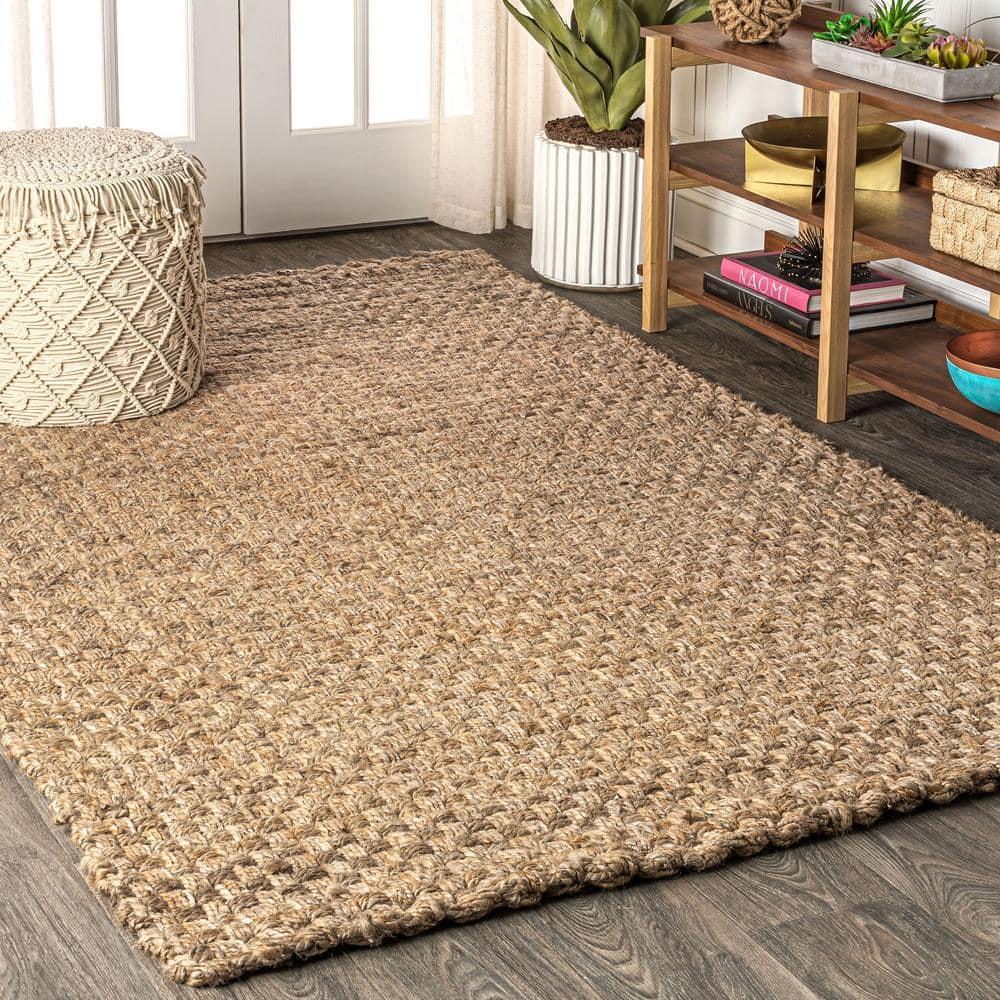 Use handwoven rugs to add texture and warmth to your Earthy Living Room