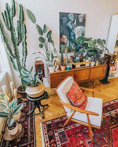 Live plants breathe life into your vintage living room, enhancing its charm