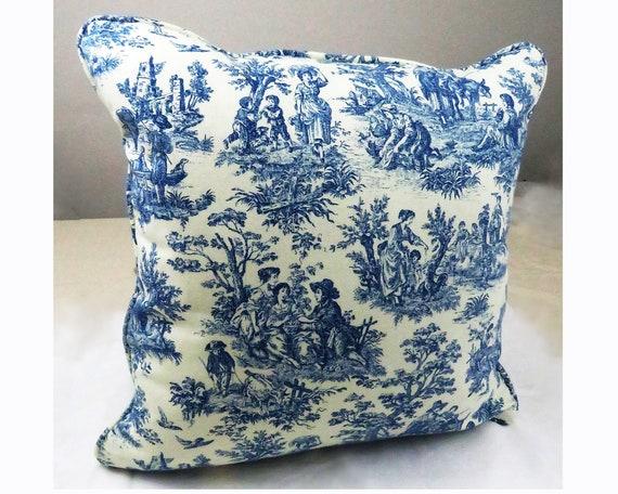 Incorporate patterned blue throw pillows for added texture and interest