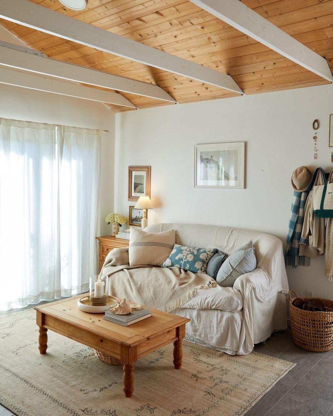 Create cozy seating nooks with layered throws in your Earthy Living Room