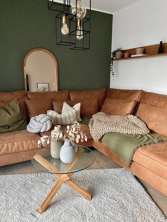 Introduce calming colors like terracotta and muted greens in your Boho Living Room design