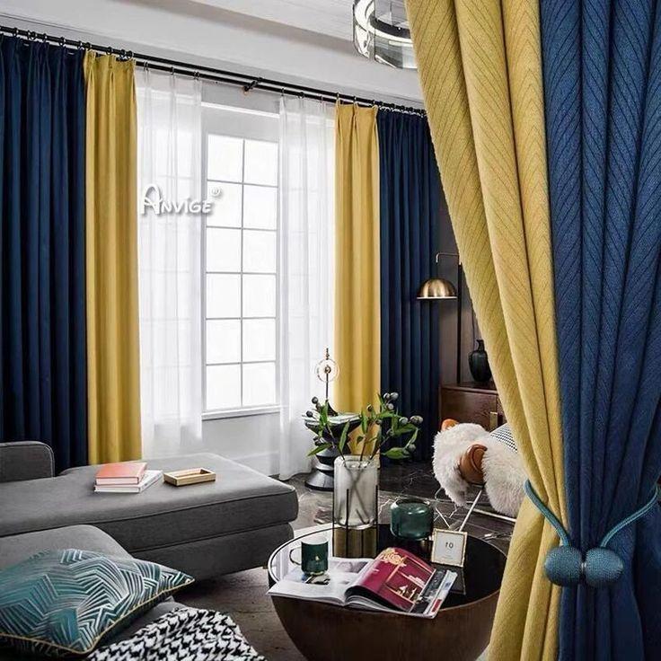 Install blue curtains for an elegant touch to your living room