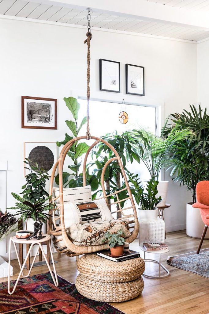Create a reading nook by adding a hammock chair to your Boho Living Room