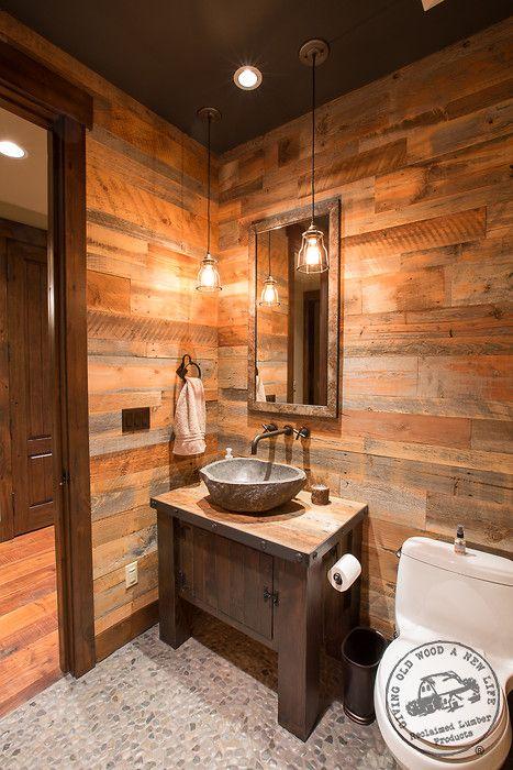 Charred wood elements add rustic charm to your boho ‌bathroom