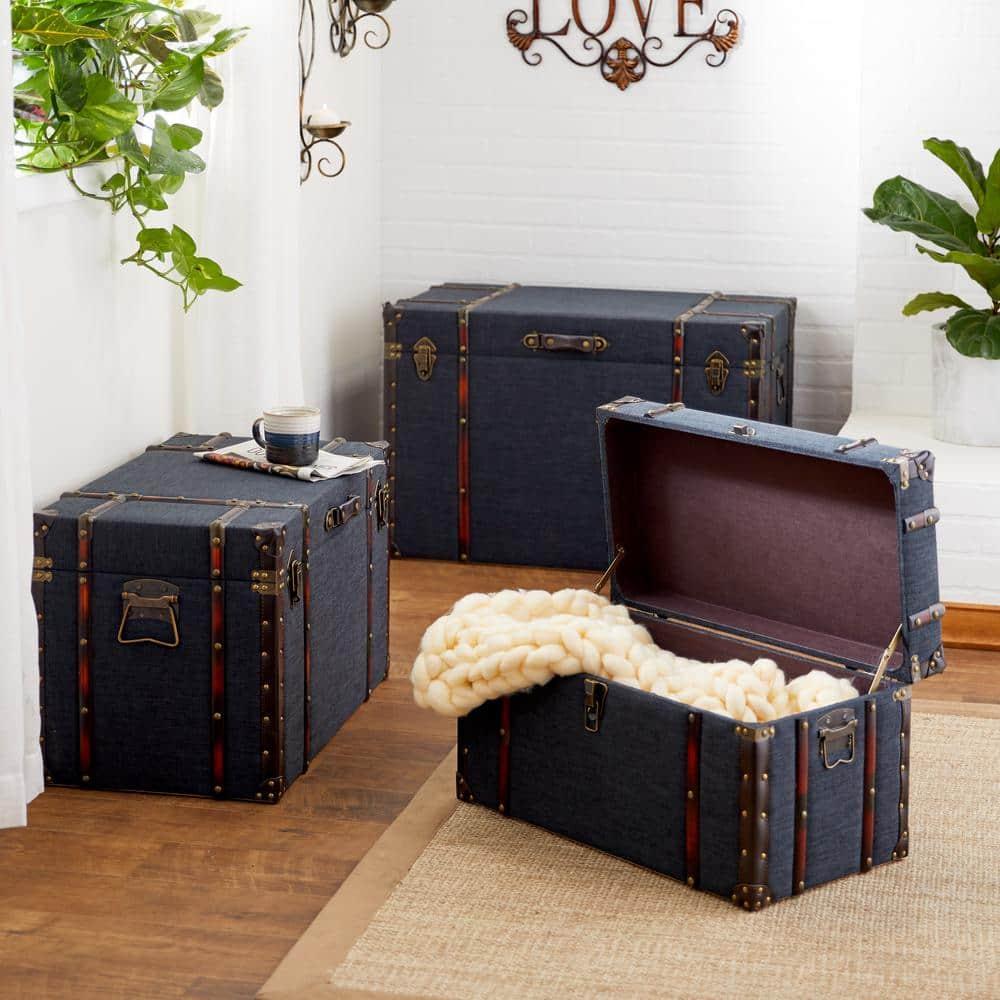 Add a vintage blue ‍trunk⁢ for stylish storage in⁣ your living ⁢room