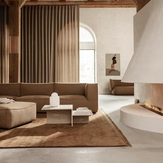 Choose earth-toned curtains that filter light softly in your Earthy Living Room