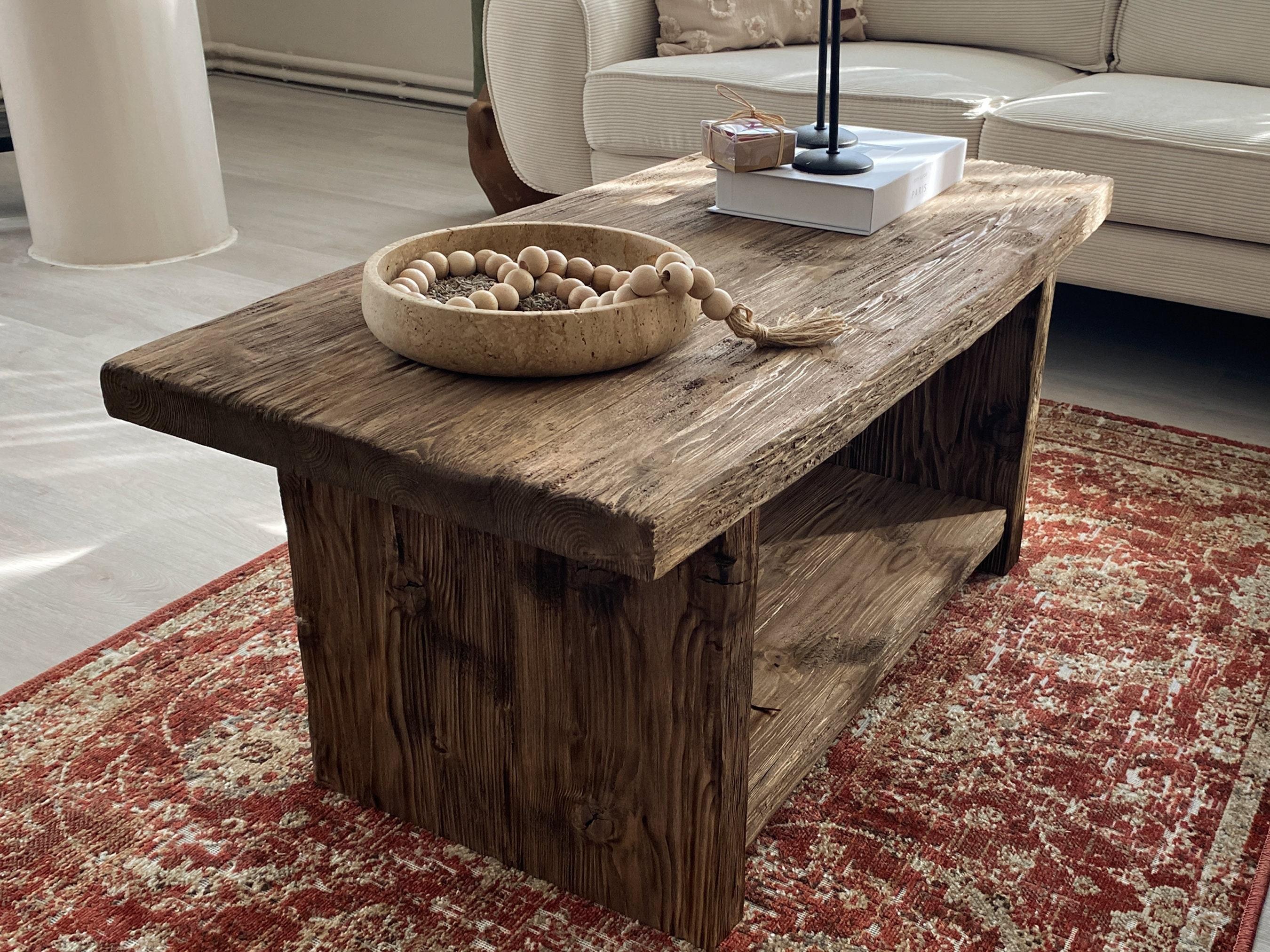 Incorporate a reclaimed wood coffee table for character in your earthy living room