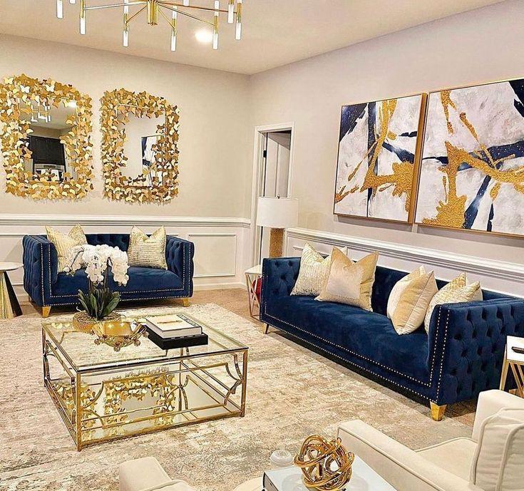 Combine blue with gold accents for a chic blue living room